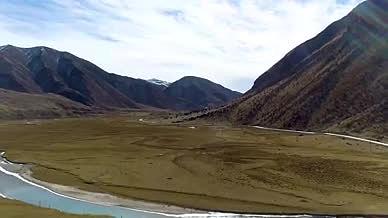 布加雪山穹雄沟草原湿地河流航拍4K视频的预览图